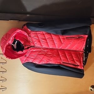 Red and black Calvin Klein performance jacket with hood.